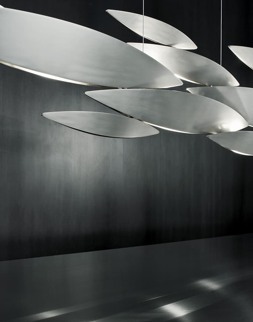 Luxury Italian pendant light—Terzani I Lucci Argentati featuring shimmering linear forms