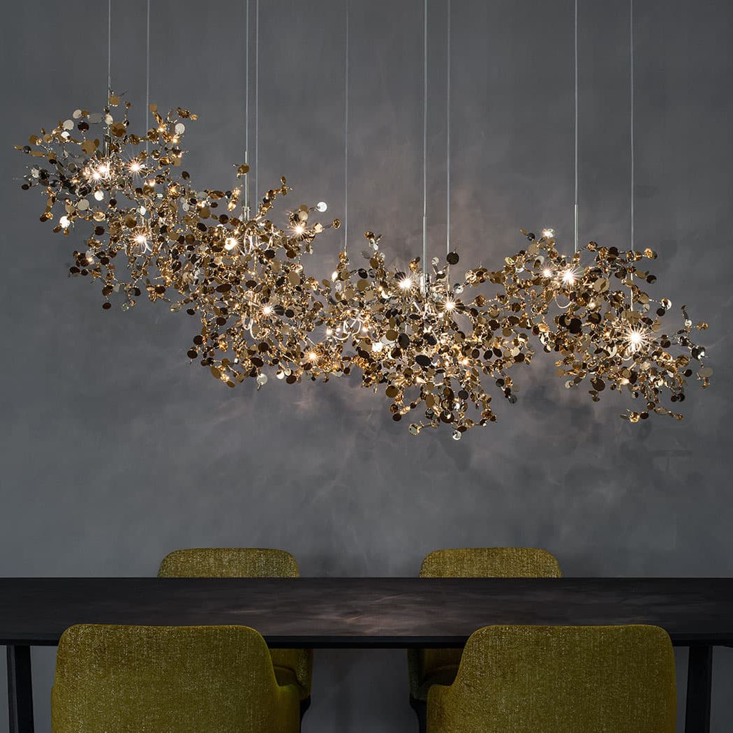 Argent Linear Suspension by Terzani with shimmering clustered metal discs in a sleek linear form