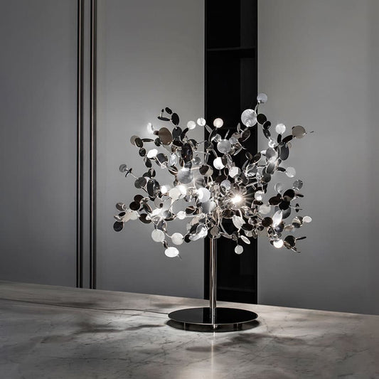 Luxury Italian table lamp—Terzani Argent with sculptural reflective metal elements