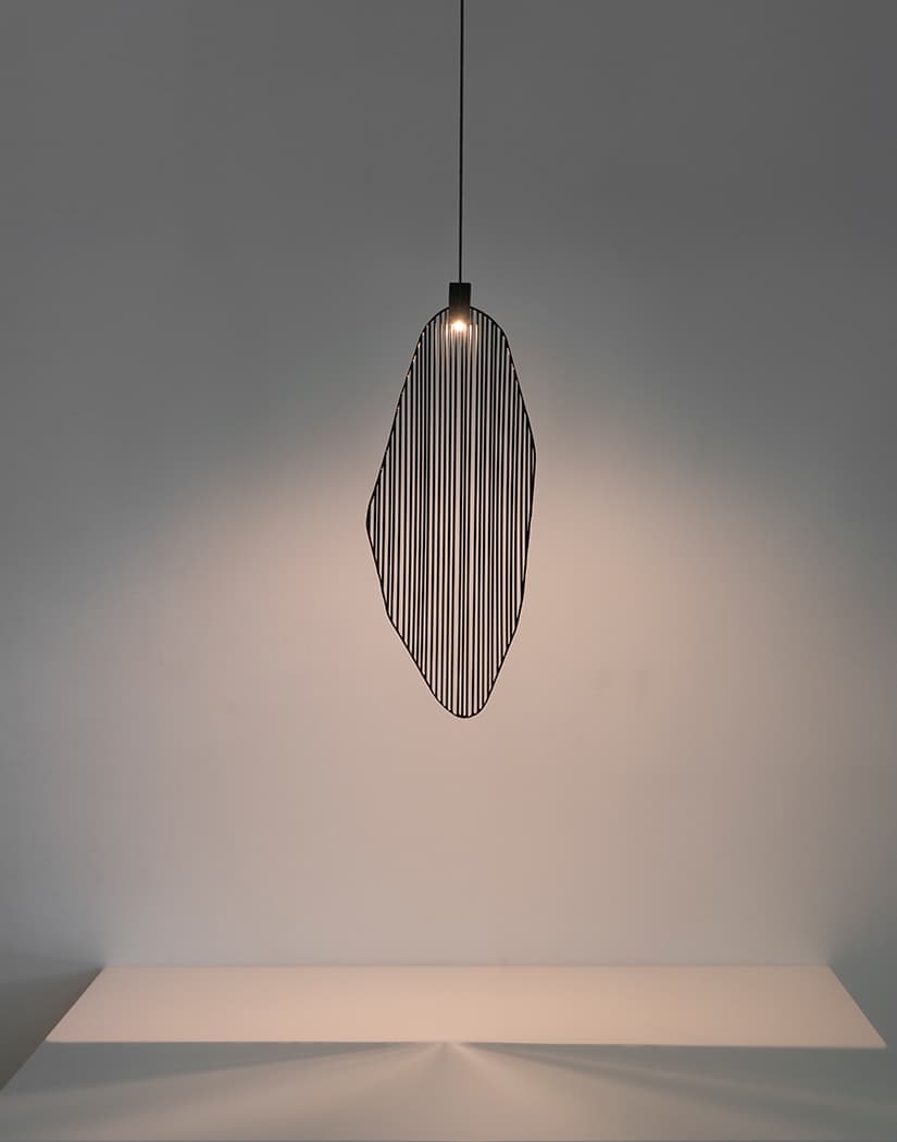 Italian-made Terzani Harpe light showcasing modern design and warm ambient glow