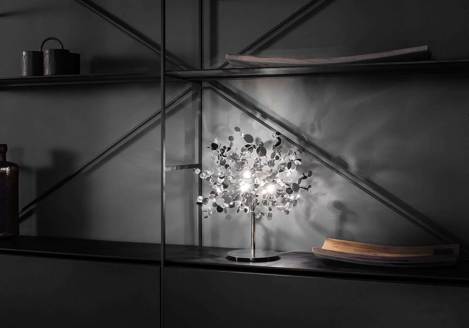 Luxury Italian table lamp—Terzani Argent with sculptural reflective metal elements