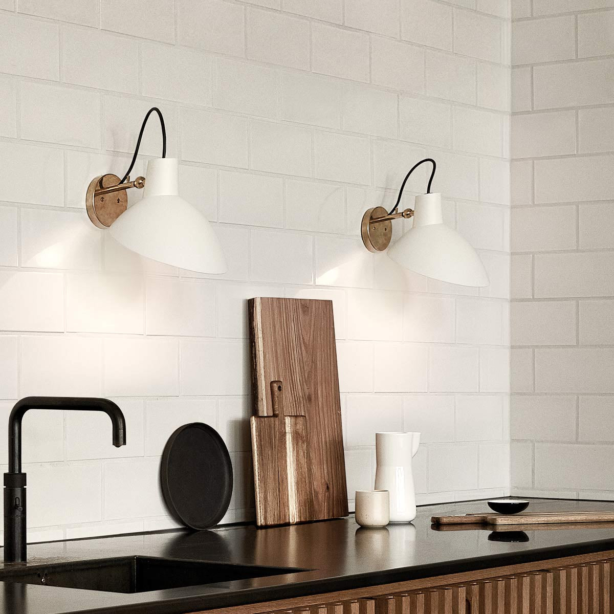 Astep VV Cinquanta Wall Lamp featuring a single adjustable aluminum reflector on a brass arm, showcasing elegant mid-century modern design.