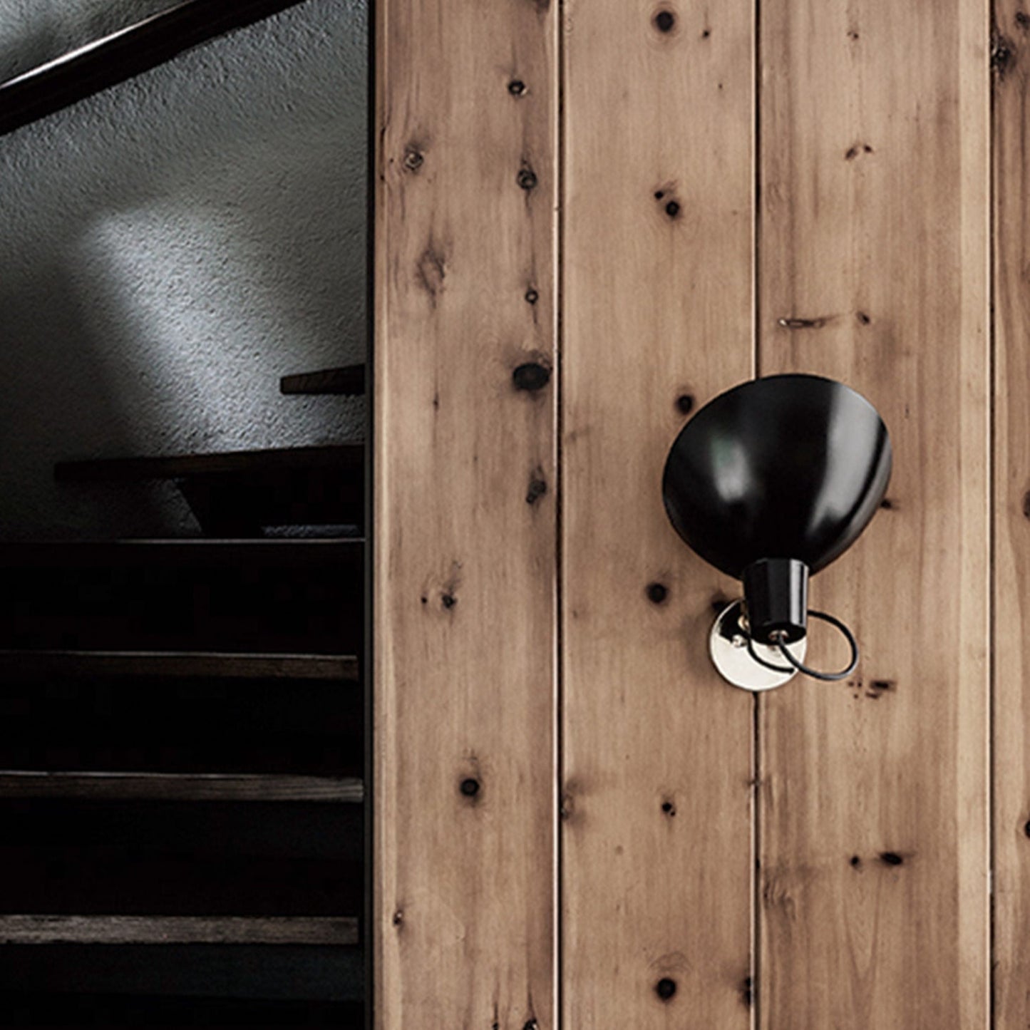 Astep VV Cinquanta Wall Lamp featuring a single adjustable aluminum reflector on a brass arm, showcasing elegant mid-century modern design.