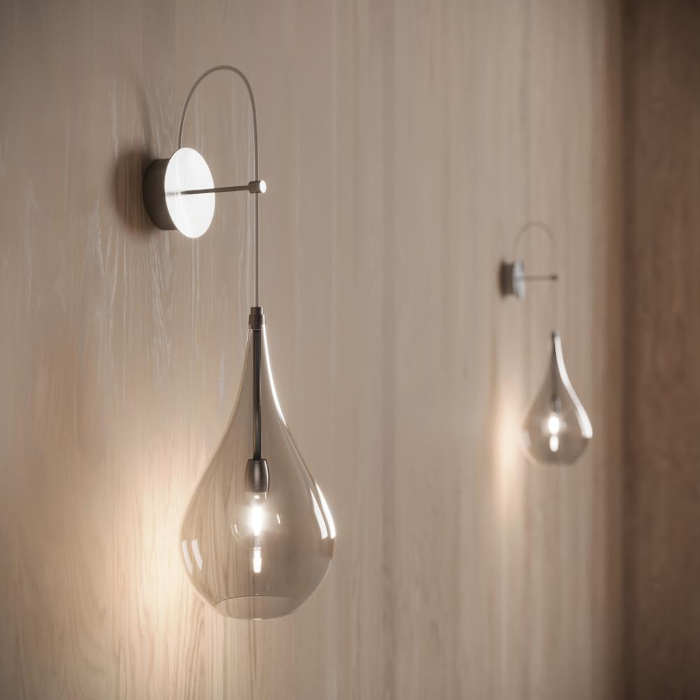 Contemporary wall lamp—LACRIMA© by Cangini & Tucci with refined teardrop silhouette.