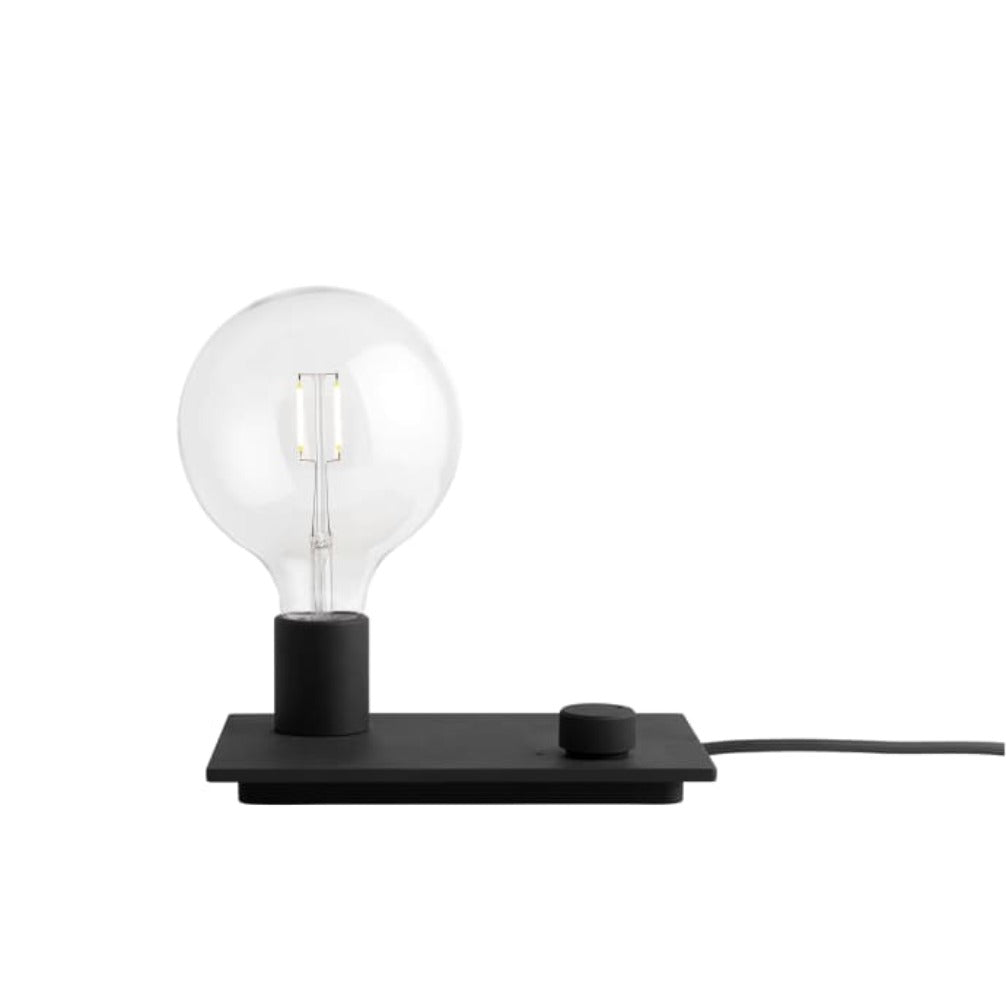 The Control Table Lamp places the iconic E27 bulb in a modern context.  With the user being able to alter the volume of light emitted according to their preferences through the playful turn of a dial, the Control Table Lamp combines industrial design with Scandinavian values.