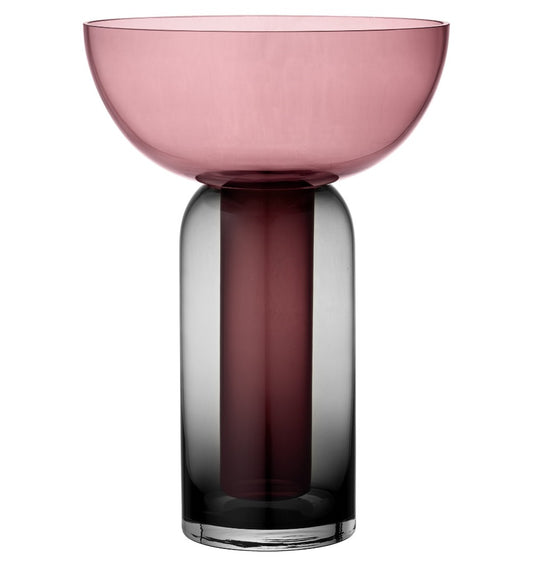 The Torus vase is a unique luxury statement in any home with its exclusive look - perfect for flower decorations, branches and plants.  The combination of the two colourful glass pieces turn into an elegant and sculptural vase, making it ideal for everyone who are looking for that extra something special.  Dia 25 cm x H 33 cm  100% Glass